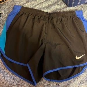 Size large black and blue Nike shorts